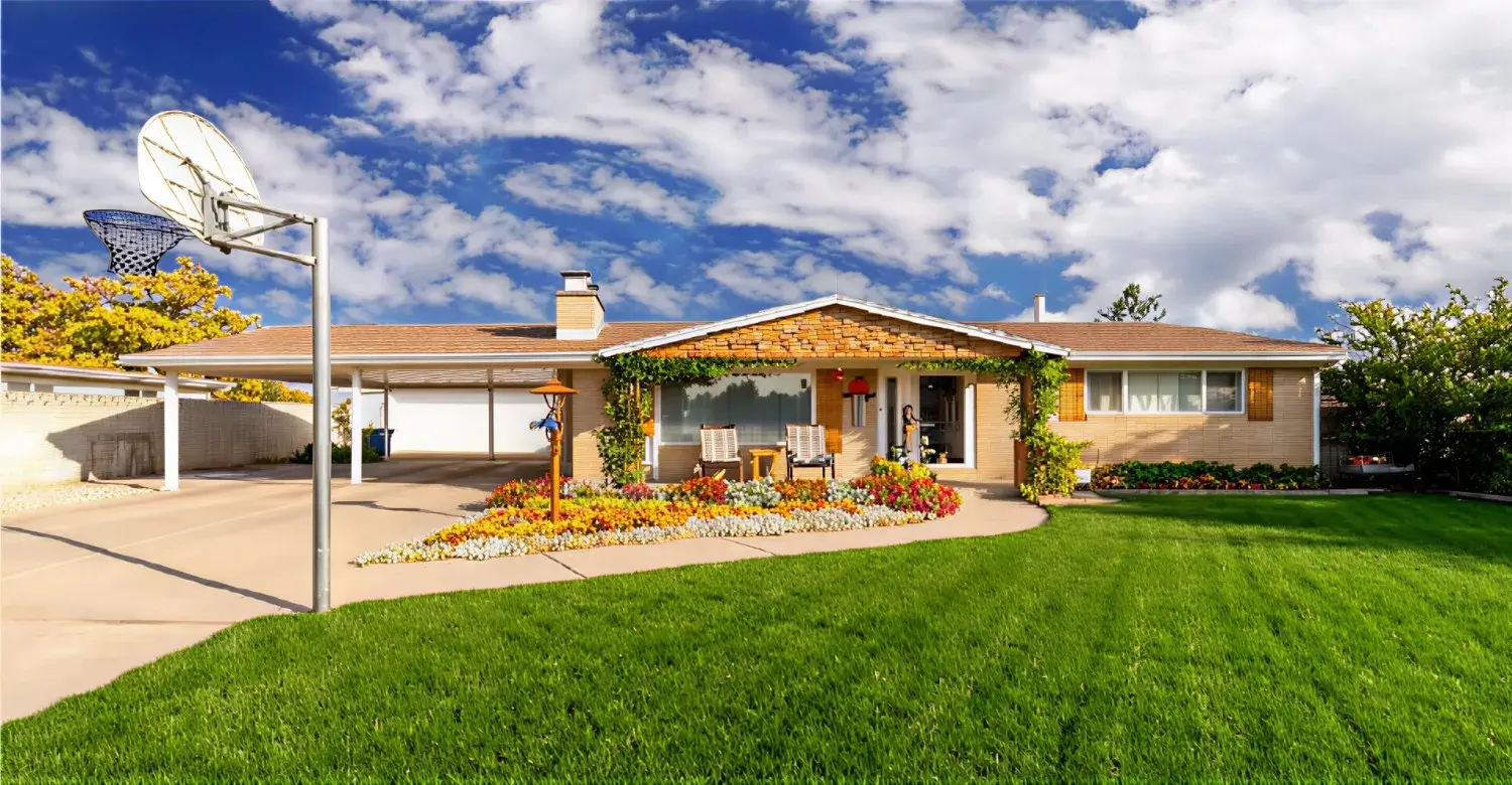 Well-kept suburban single-family home with landscaped front yard and driveway, representing residential communities affected by private equity in community association management.